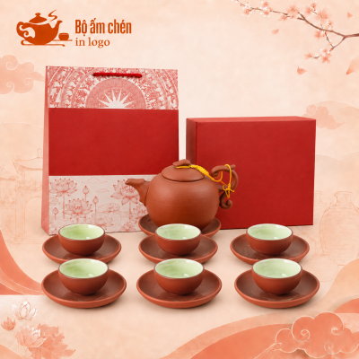 Bộ ấm chén tử sa nâu đỏ in logo dáng tròn trơn quai cách điệu TS-12